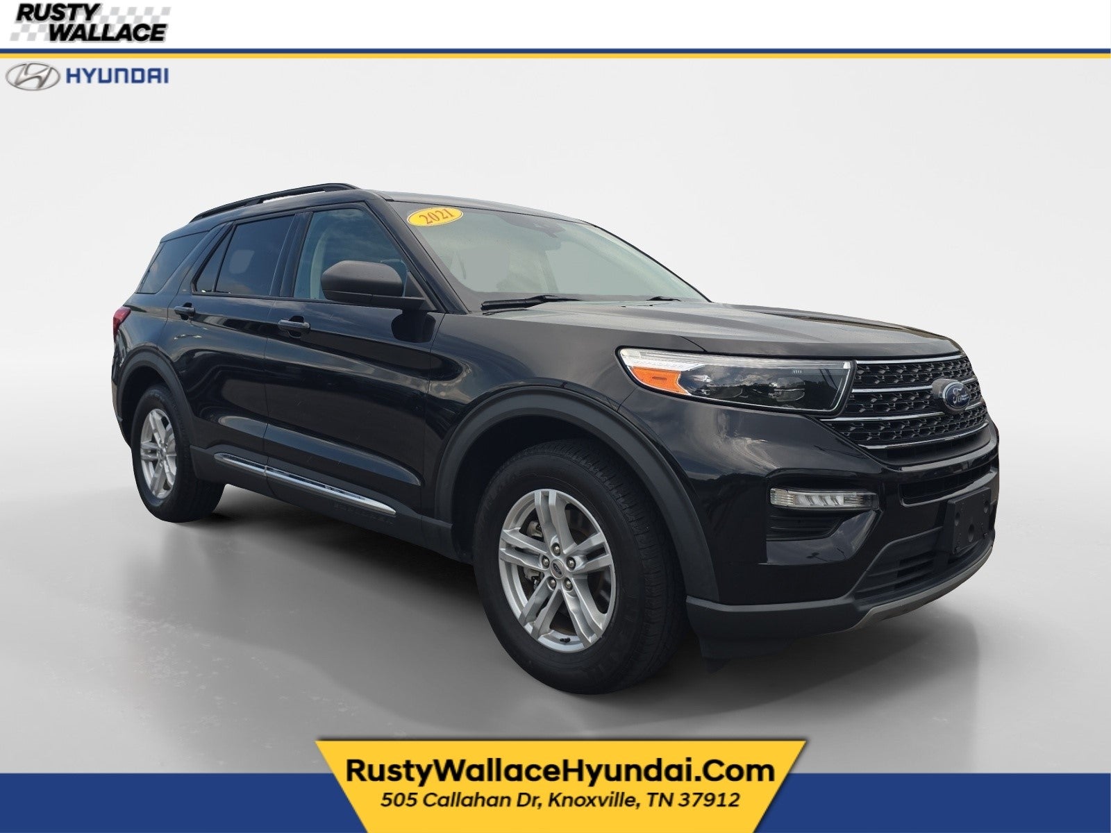 2021 Ford Explorer XLT in Agate Black Metallic — front three-quarter view