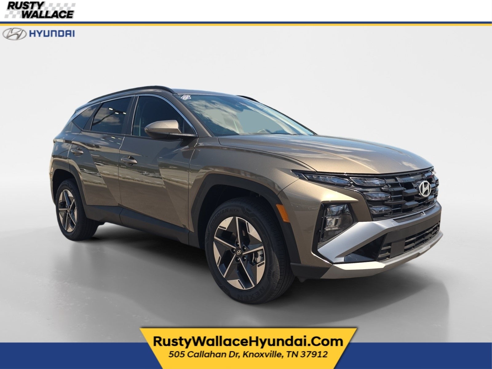 2026 Hyundai TUCSON HYBRID SEL in Cashmere Bronze — front three-quarter view