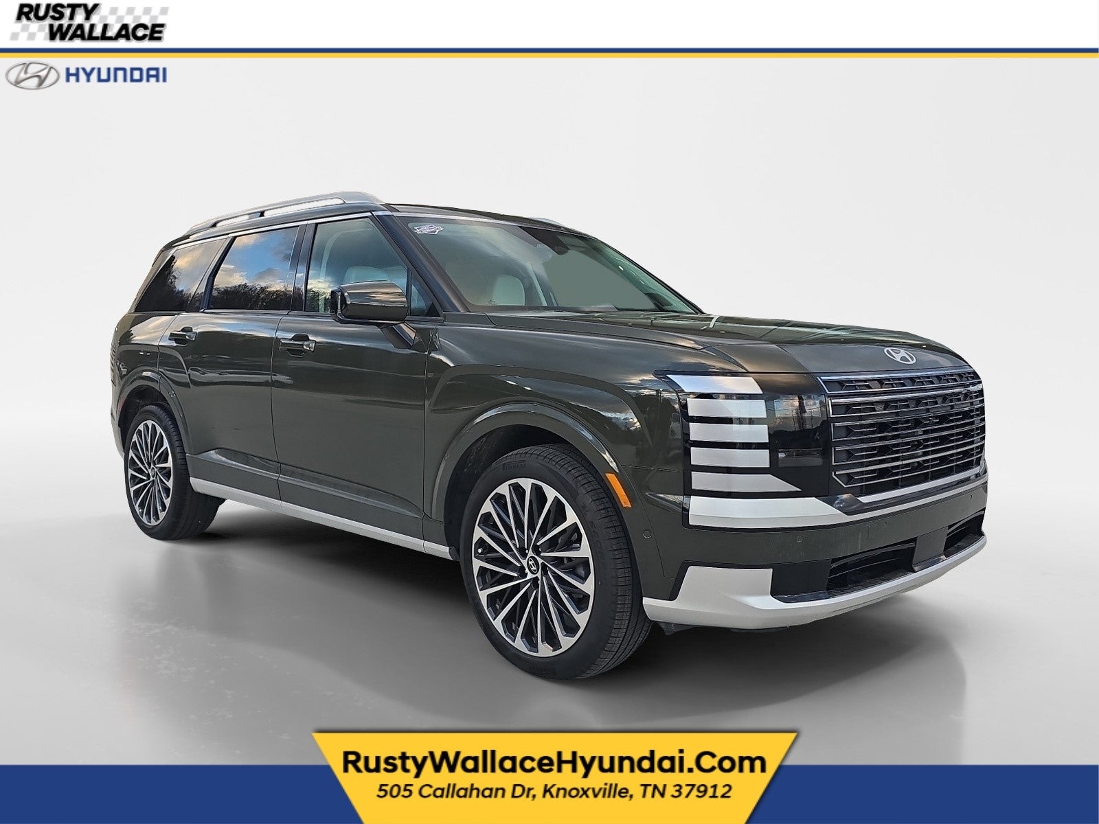 2026 Hyundai PALISADE Calligraphy in Titan Charcoal Pearl — front three-quarter view